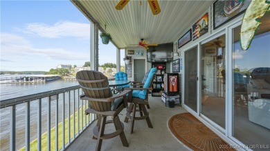 Welcome to your lakefront retreat in the most sought after on Seasons Ridge At Four Seasons in Missouri - for sale on GolfHomes.com, golf home, golf lot