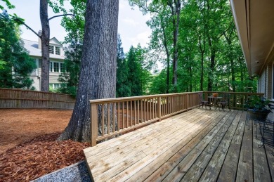 Stunning home with a rocking chair front porch on a friendly on Bobby Jones Golf Club in Georgia - for sale on GolfHomes.com, golf home, golf lot