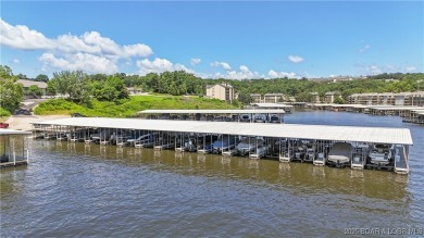 Welcome to your lakefront retreat in the most sought after on Seasons Ridge At Four Seasons in Missouri - for sale on GolfHomes.com, golf home, golf lot