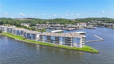 Welcome to your lakefront retreat in the most sought after on Seasons Ridge At Four Seasons in Missouri - for sale on GolfHomes.com, golf home, golf lot
