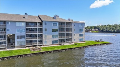 Welcome to your lakefront retreat in the most sought after on Seasons Ridge At Four Seasons in Missouri - for sale on GolfHomes.com, golf home, golf lot