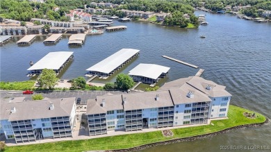 Welcome to your lakefront retreat in the most sought after on Seasons Ridge At Four Seasons in Missouri - for sale on GolfHomes.com, golf home, golf lot