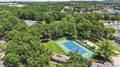 Welcome to your lakefront retreat in the most sought after on Seasons Ridge At Four Seasons in Missouri - for sale on GolfHomes.com, golf home, golf lot