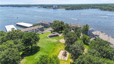 Welcome to your lakefront retreat in the most sought after on Seasons Ridge At Four Seasons in Missouri - for sale on GolfHomes.com, golf home, golf lot