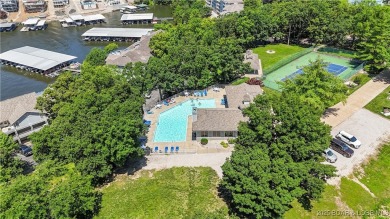 Welcome to your lakefront retreat in the most sought after on Seasons Ridge At Four Seasons in Missouri - for sale on GolfHomes.com, golf home, golf lot