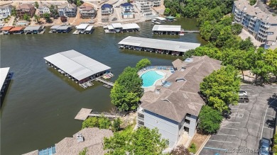 Welcome to your lakefront retreat in the most sought after on Seasons Ridge At Four Seasons in Missouri - for sale on GolfHomes.com, golf home, golf lot