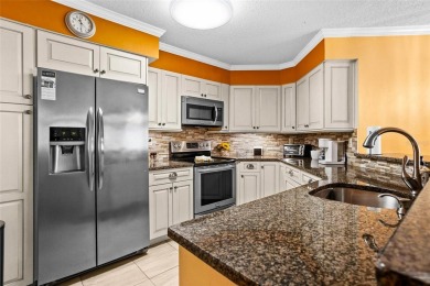 Experience the pinnacle of Florida Gulfcoast living in this on Isla Del Sol Yacht and Country Club in Florida - for sale on GolfHomes.com, golf home, golf lot