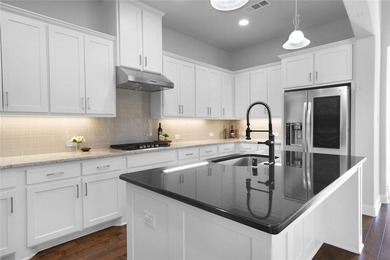 Welcome to resort-style living in The Tribute, a premier on The Tribute At the Colony in Texas - for sale on GolfHomes.com, golf home, golf lot