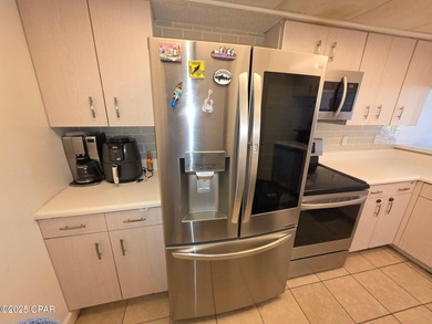 Hombre Golf Villa located very close to sandy white beaches and on Hombre Golf Club in Florida - for sale on GolfHomes.com, golf home, golf lot