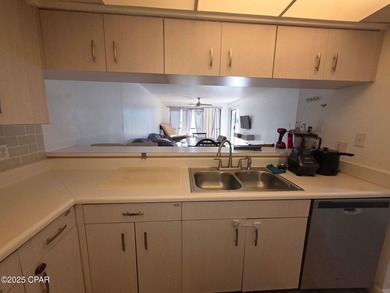 Hombre Golf Villa located very close to sandy white beaches and on Hombre Golf Club in Florida - for sale on GolfHomes.com, golf home, golf lot