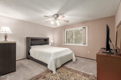 This well-cared-for 2-bedroom, 1.75-bath townhome is move-in on Sun City Lakes West and East in Arizona - for sale on GolfHomes.com, golf home, golf lot