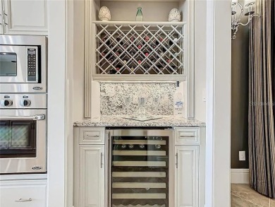 Discover a stunning transitional home with an *Active Reunion on ChampionsGate Golf Resort in Florida - for sale on GolfHomes.com, golf home, golf lot
