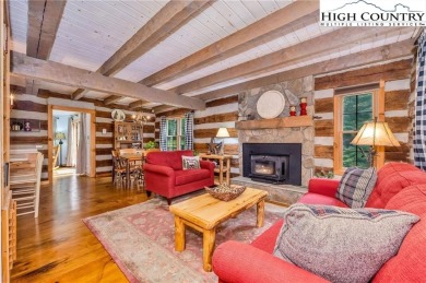 Welcome to your dream retreat. This charming log cabin is on Mountain Aire Golf Course in North Carolina - for sale on GolfHomes.com, golf home, golf lot