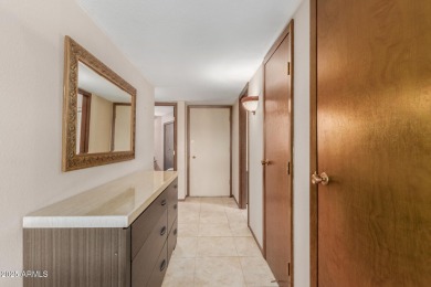 This well-cared-for 2-bedroom, 1.75-bath townhome is move-in on Sun City Lakes West and East in Arizona - for sale on GolfHomes.com, golf home, golf lot