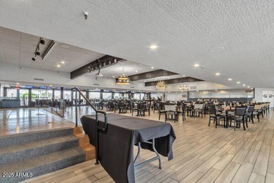 Don't judge this home by the front door. Inside, it's calm on Sun Lakes Country Club in Arizona - for sale on GolfHomes.com, golf home, golf lot