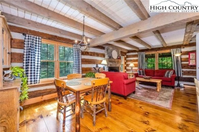 Welcome to your dream retreat. This charming log cabin is on Mountain Aire Golf Course in North Carolina - for sale on GolfHomes.com, golf home, golf lot
