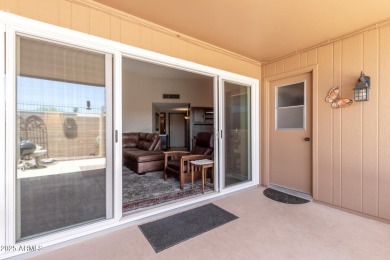This well-cared-for 2-bedroom, 1.75-bath townhome is move-in on Sun City Lakes West and East in Arizona - for sale on GolfHomes.com, golf home, golf lot