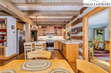 Welcome to your dream retreat. This charming log cabin is on Mountain Aire Golf Course in North Carolina - for sale on GolfHomes.com, golf home, golf lot