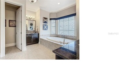 Discover a stunning transitional home with an *Active Reunion on ChampionsGate Golf Resort in Florida - for sale on GolfHomes.com, golf home, golf lot