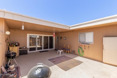 This well-cared-for 2-bedroom, 1.75-bath townhome is move-in on Sun City Lakes West and East in Arizona - for sale on GolfHomes.com, golf home, golf lot