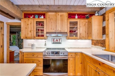 Welcome to your dream retreat. This charming log cabin is on Mountain Aire Golf Course in North Carolina - for sale on GolfHomes.com, golf home, golf lot