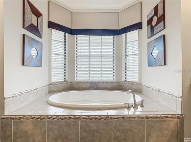 Discover a stunning transitional home with an *Active Reunion on ChampionsGate Golf Resort in Florida - for sale on GolfHomes.com, golf home, golf lot