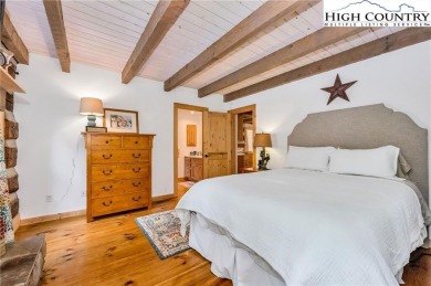 Welcome to your dream retreat. This charming log cabin is on Mountain Aire Golf Course in North Carolina - for sale on GolfHomes.com, golf home, golf lot