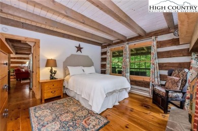 Welcome to your dream retreat. This charming log cabin is on Mountain Aire Golf Course in North Carolina - for sale on GolfHomes.com, golf home, golf lot