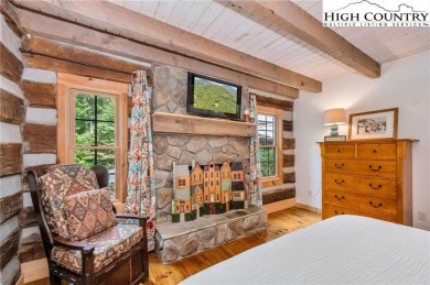 Welcome to your dream retreat. This charming log cabin is on Mountain Aire Golf Course in North Carolina - for sale on GolfHomes.com, golf home, golf lot