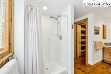 Welcome to your dream retreat. This charming log cabin is on Mountain Aire Golf Course in North Carolina - for sale on GolfHomes.com, golf home, golf lot