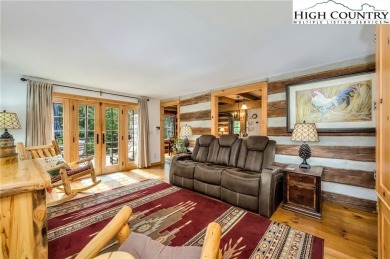 Welcome to your dream retreat. This charming log cabin is on Mountain Aire Golf Course in North Carolina - for sale on GolfHomes.com, golf home, golf lot