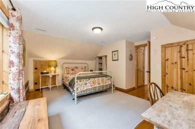 Welcome to your dream retreat. This charming log cabin is on Mountain Aire Golf Course in North Carolina - for sale on GolfHomes.com, golf home, golf lot