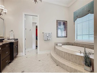 Discover a stunning transitional home with an *Active Reunion on ChampionsGate Golf Resort in Florida - for sale on GolfHomes.com, golf home, golf lot
