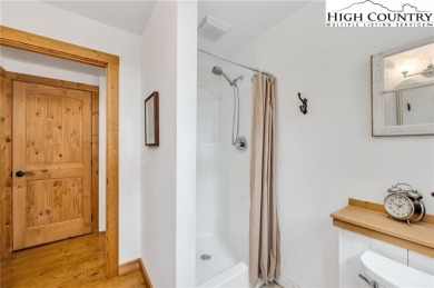 Welcome to your dream retreat. This charming log cabin is on Mountain Aire Golf Course in North Carolina - for sale on GolfHomes.com, golf home, golf lot