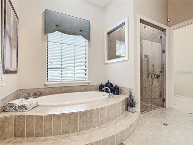 Discover a stunning transitional home with an *Active Reunion on ChampionsGate Golf Resort in Florida - for sale on GolfHomes.com, golf home, golf lot