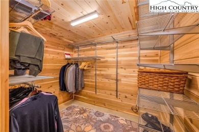 Welcome to your dream retreat. This charming log cabin is on Mountain Aire Golf Course in North Carolina - for sale on GolfHomes.com, golf home, golf lot