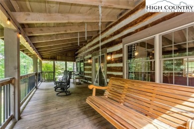 Welcome to your dream retreat. This charming log cabin is on Mountain Aire Golf Course in North Carolina - for sale on GolfHomes.com, golf home, golf lot