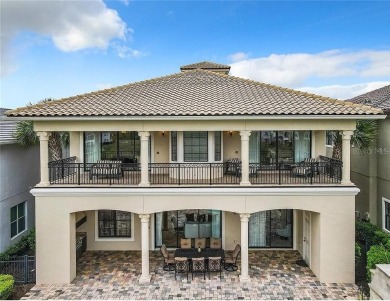 Discover a stunning transitional home with an *Active Reunion on ChampionsGate Golf Resort in Florida - for sale on GolfHomes.com, golf home, golf lot