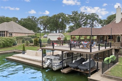 Experience the pinnacle of lakeside luxury with this exquisitely on Cedar Creek Country Club in Texas - for sale on GolfHomes.com, golf home, golf lot