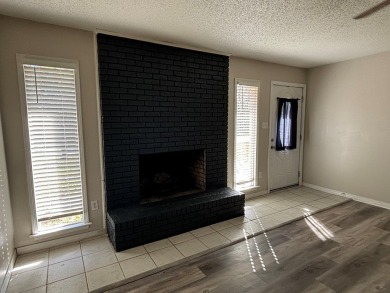 This 3 bedroom home is located in Diamondhead. Wood burning on Diamondhead Country Club in Mississippi - for sale on GolfHomes.com, golf home, golf lot