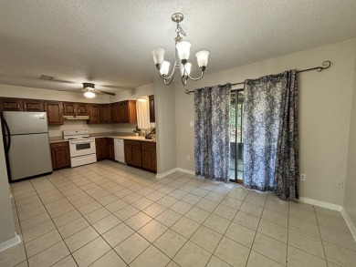This 3 bedroom home is located in Diamondhead. Wood burning on Diamondhead Country Club in Mississippi - for sale on GolfHomes.com, golf home, golf lot
