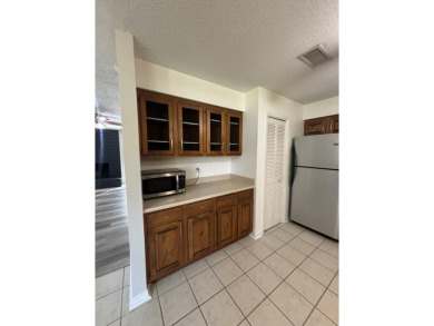 This 3 bedroom home is located in Diamondhead. Wood burning on Diamondhead Country Club in Mississippi - for sale on GolfHomes.com, golf home, golf lot