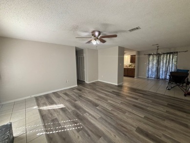 This 3 bedroom home is located in Diamondhead. Wood burning on Diamondhead Country Club in Mississippi - for sale on GolfHomes.com, golf home, golf lot