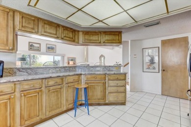 This rare 2 bedroom-3 bedroom, 3 bathroom multi-level townhome on Pasadena Yacht and Country Club in Florida - for sale on GolfHomes.com, golf home, golf lot