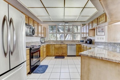This rare 2 bedroom-3 bedroom, 3 bathroom multi-level townhome on Pasadena Yacht and Country Club in Florida - for sale on GolfHomes.com, golf home, golf lot