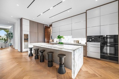 Step into unparalleled luxury in this brand-new custom estate on Jonathans Landing Golf Club in Florida - for sale on GolfHomes.com, golf home, golf lot