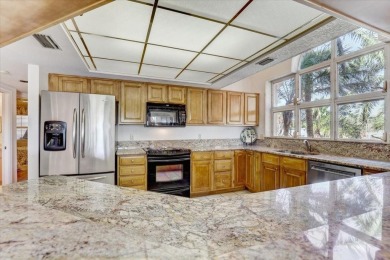 This rare 2 bedroom-3 bedroom, 3 bathroom multi-level townhome on Pasadena Yacht and Country Club in Florida - for sale on GolfHomes.com, golf home, golf lot