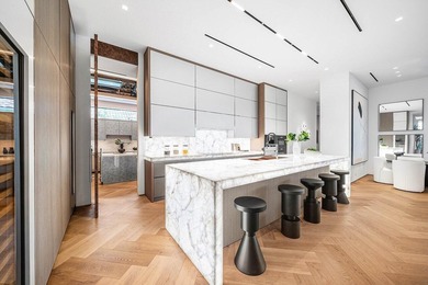 Step into unparalleled luxury in this brand-new custom estate on Jonathans Landing Golf Club in Florida - for sale on GolfHomes.com, golf home, golf lot