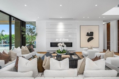 Step into unparalleled luxury in this brand-new custom estate on Jonathans Landing Golf Club in Florida - for sale on GolfHomes.com, golf home, golf lot