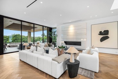 Step into unparalleled luxury in this brand-new custom estate on Jonathans Landing Golf Club in Florida - for sale on GolfHomes.com, golf home, golf lot